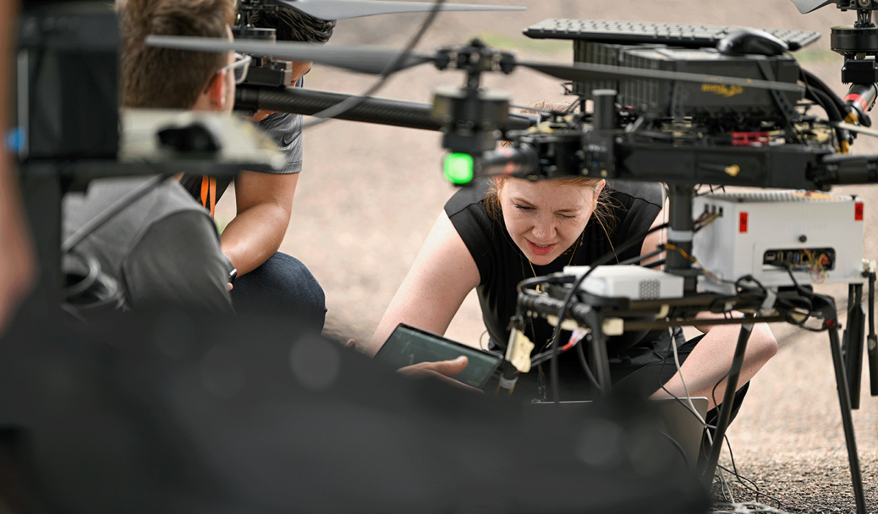 woman works on the drone