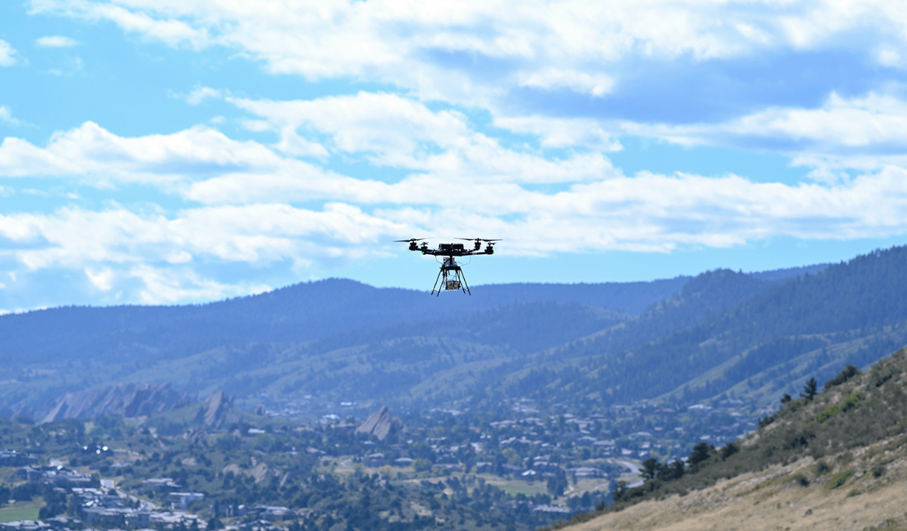 drone flying over the mountains